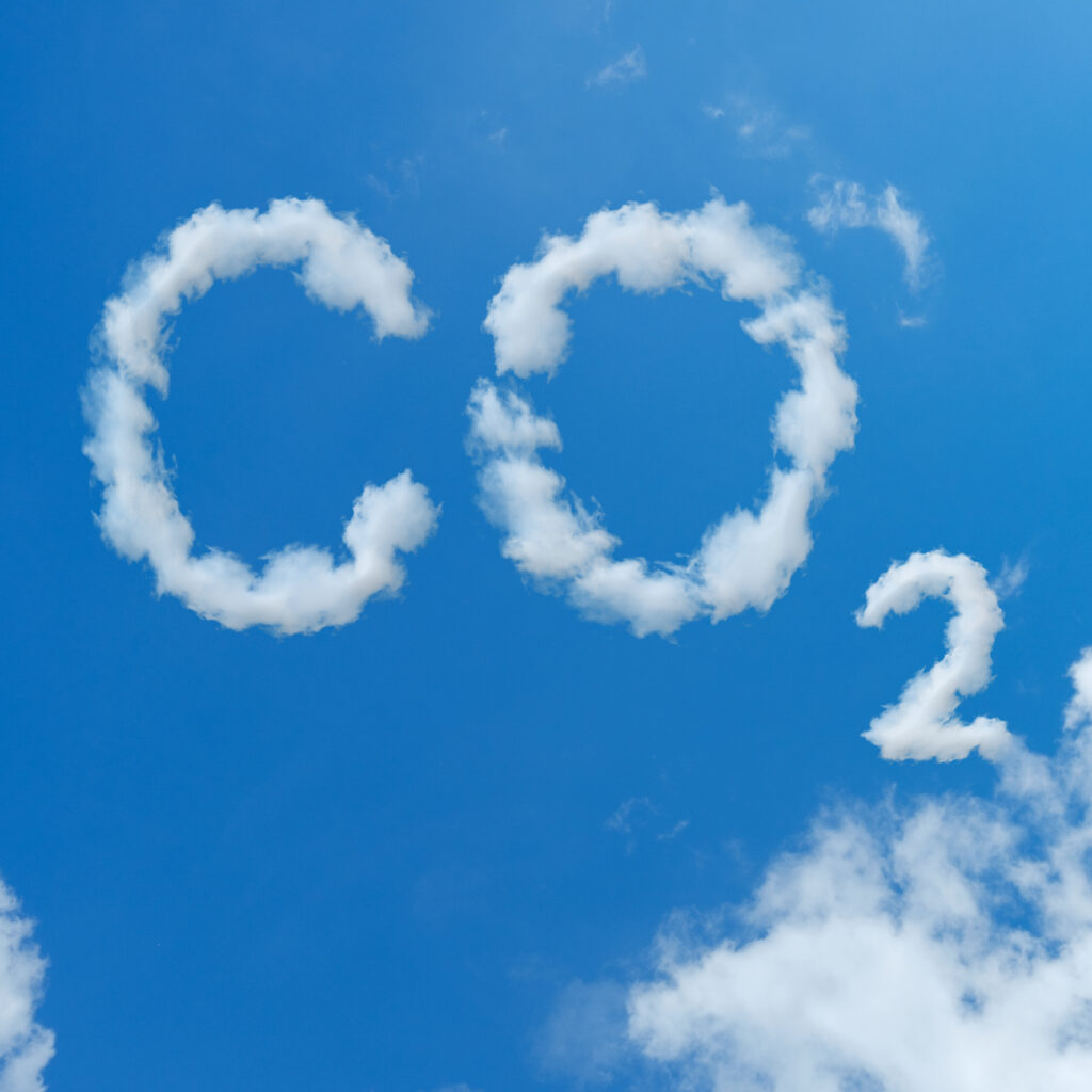 CO2 in the blue sky in the shape of the symbols.