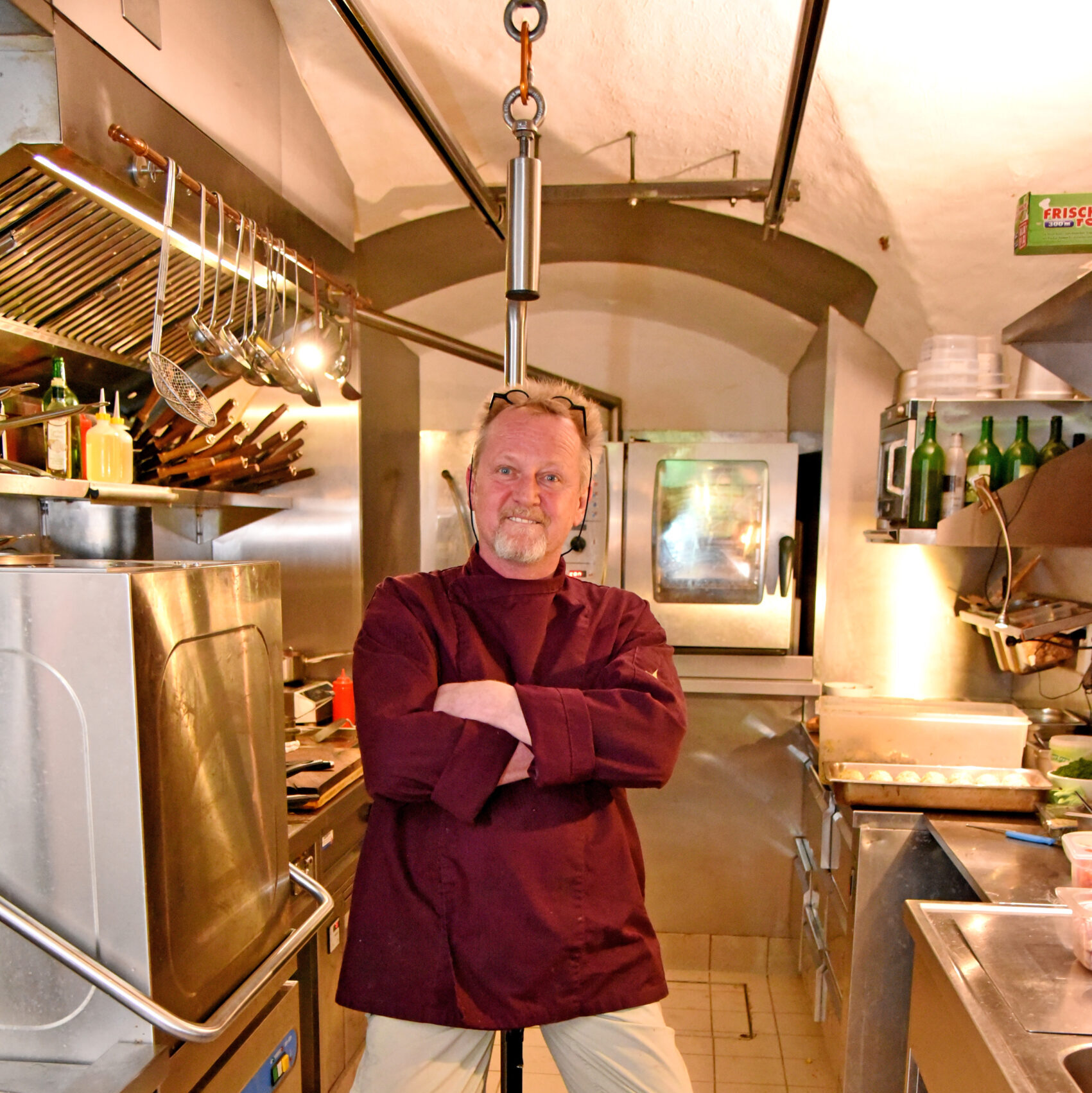 Chef’s hanging seat invention helps people with disabilities work in the kitchen