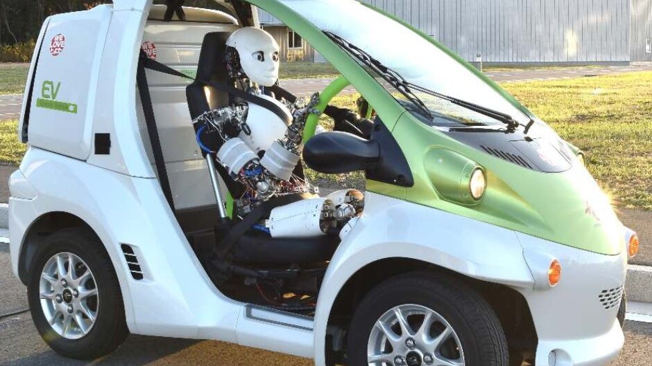 Murashi in micro EV car. Credit: University of Tokyo/arXiv. Article: VIDEO: Humanoid drives vehicle autonomously.